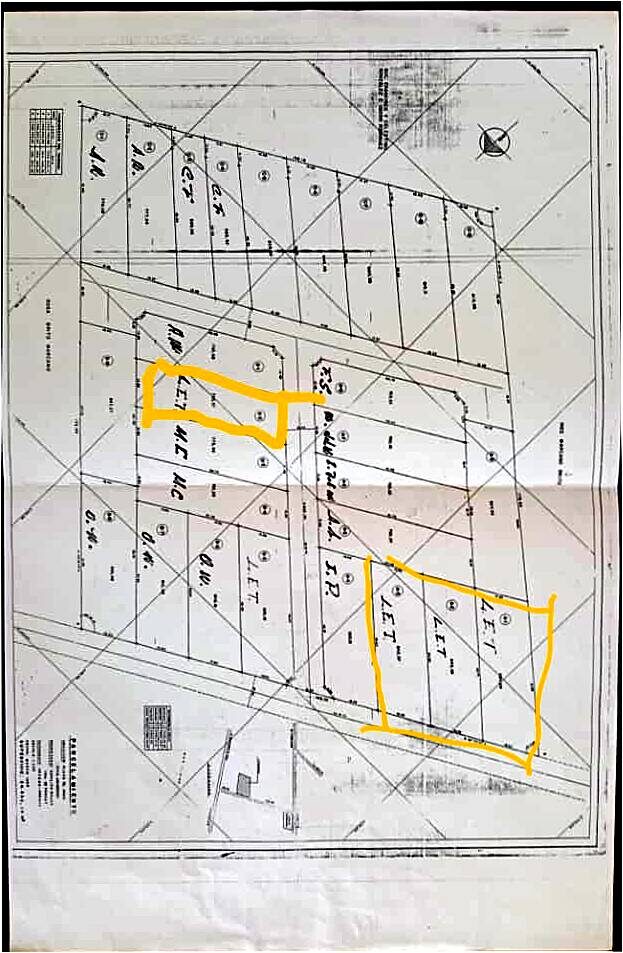 Plano del parcelamiento con las cuatro parcelas marcadas en amarillo